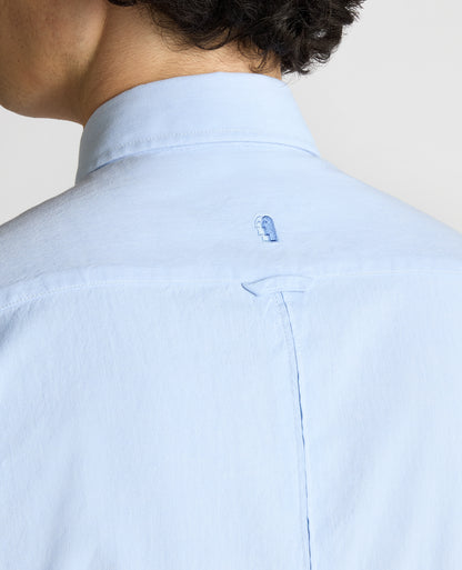 Man wearing a blue Slim Fit Cotton Oxford Shirt