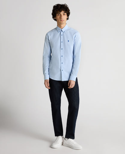 Man wearing a blue Slim Fit Cotton Oxford Shirt