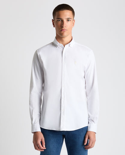 Man wearing a white Tapered Fit Oxford Cotton Shirt
