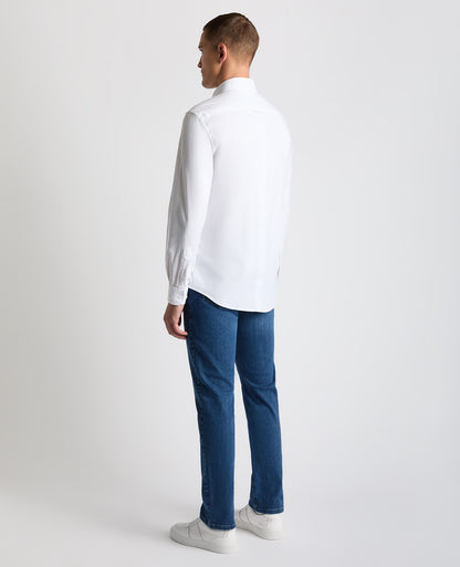 Man wearing a white Tapered Fit Oxford Cotton Shirt