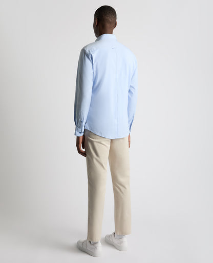 Man wearing a blue Tapered Fit Oxford Cotton Shirt