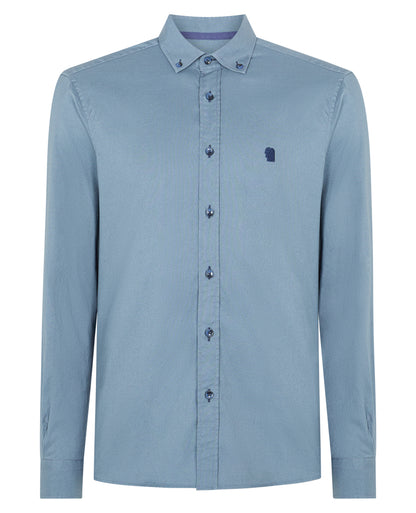 Man wearing a blue casual shirt