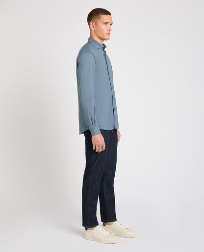 Man wearing a blue casual shirt