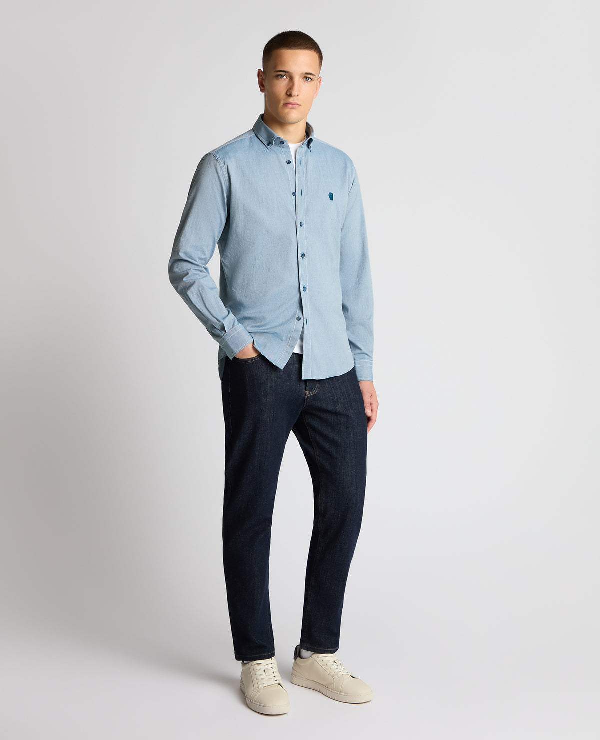 Man wearing a blue casual shirt
