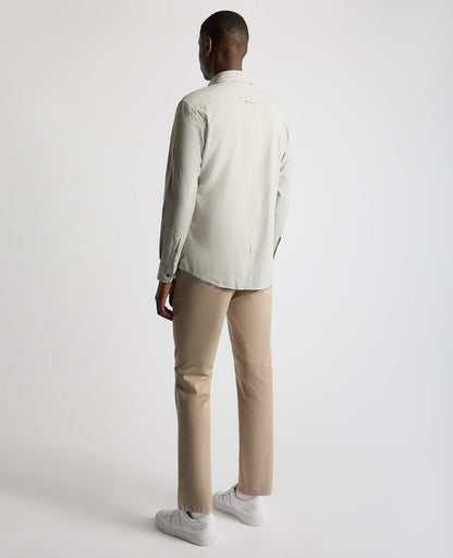 Man wearing a green Tapered Fit Oxford Cotton Shirt