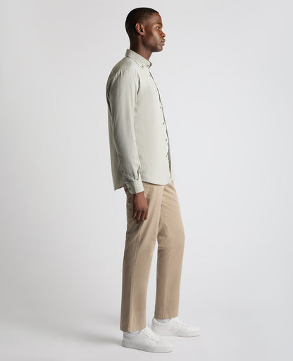 Man wearing a green Tapered Fit Oxford Cotton Shirt