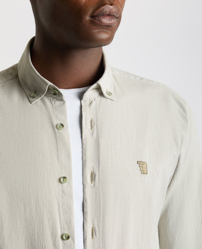 Man wearing a green Tapered Fit Oxford Cotton Shirt
