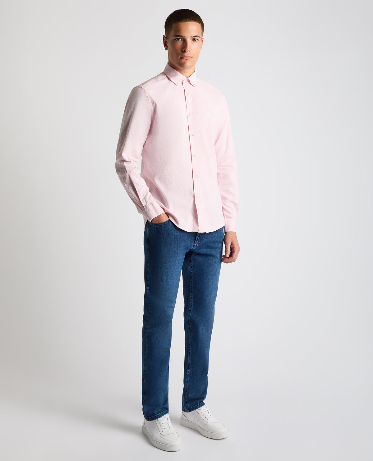 Man wearing a pink Tapered Fit Oxford Cotton Shirt