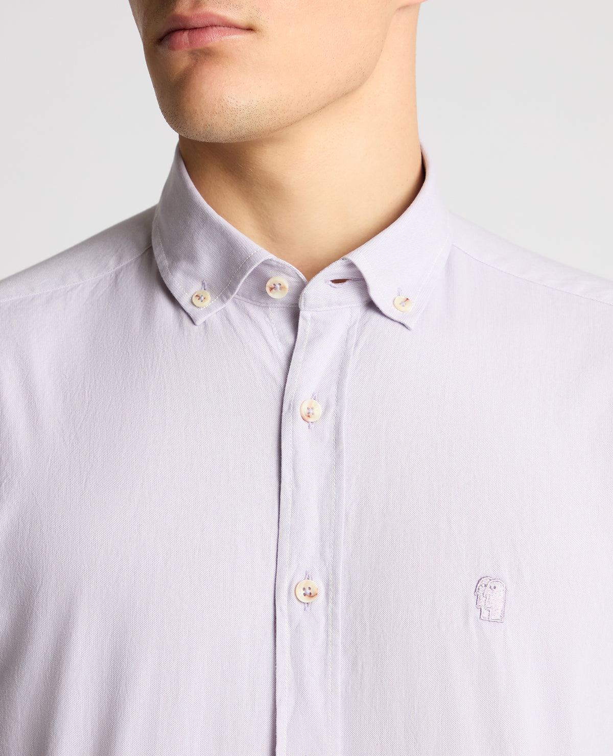 Man wearing a purple  casual shirt