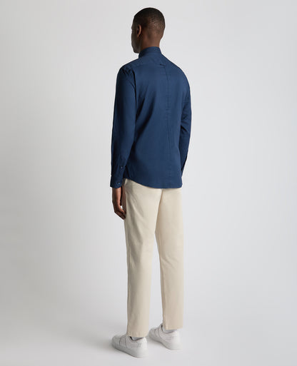 Man wearing a navy Tapered Fit Oxford Cotton Shirt