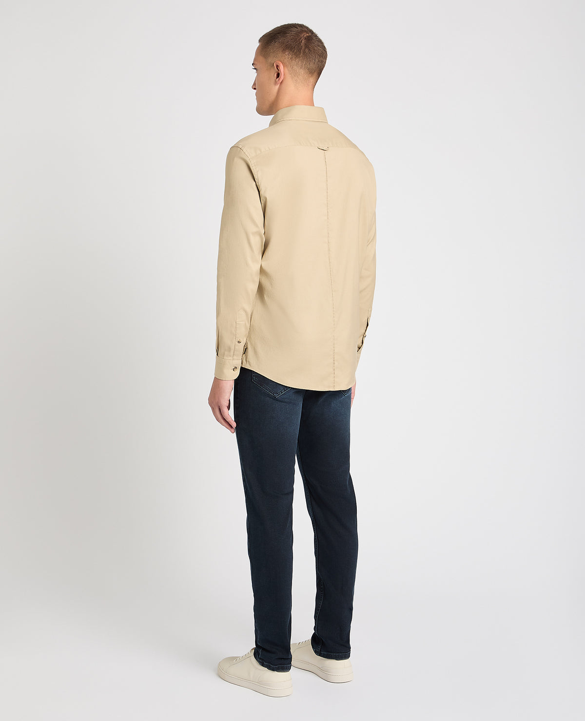 Man wearing a stone casual shirt