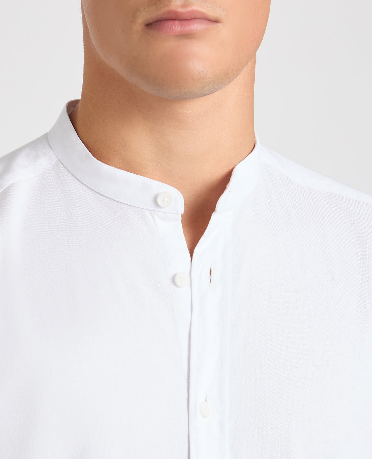 Man wearing a White casual shirt