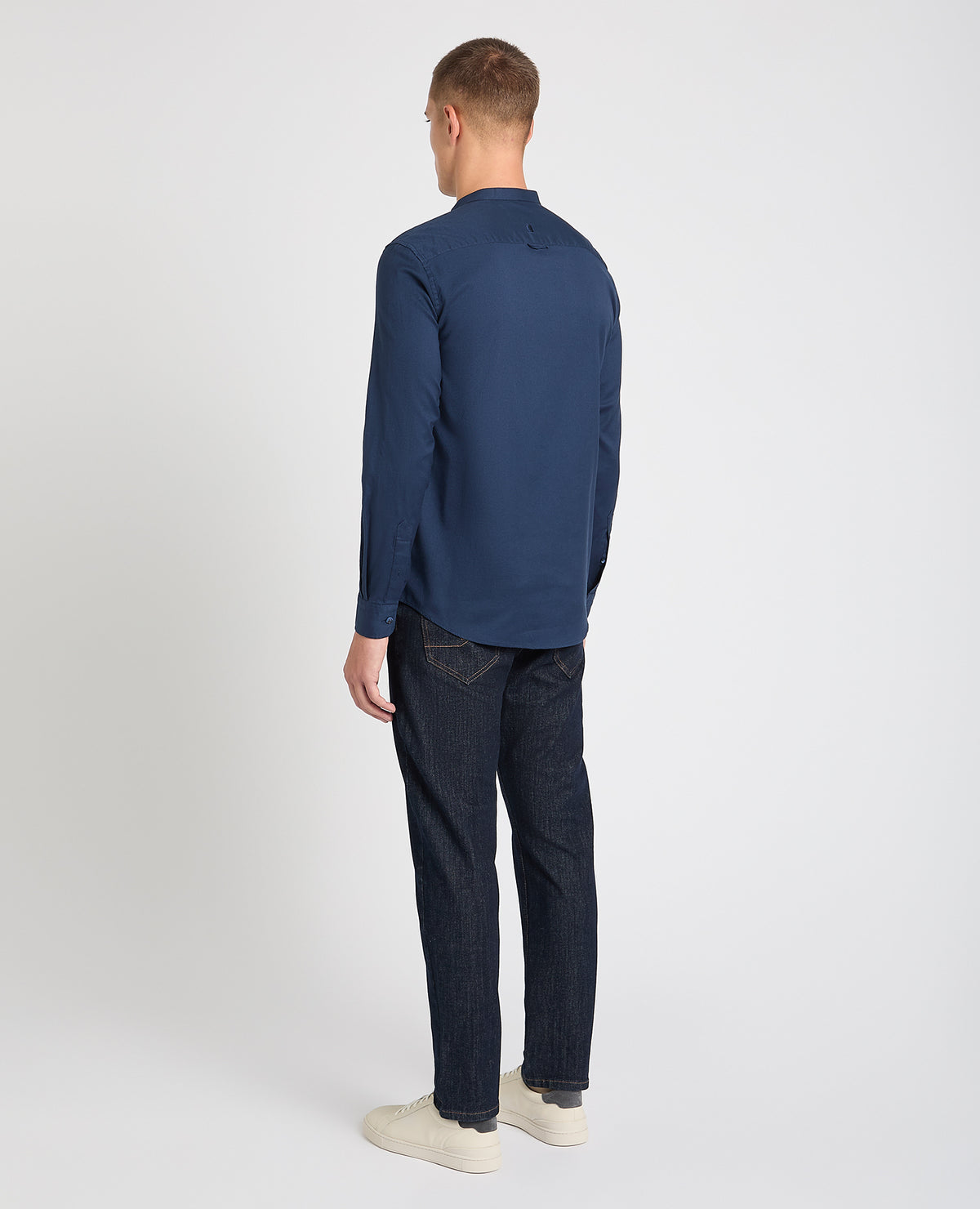 Man wearing a navy casual shirt