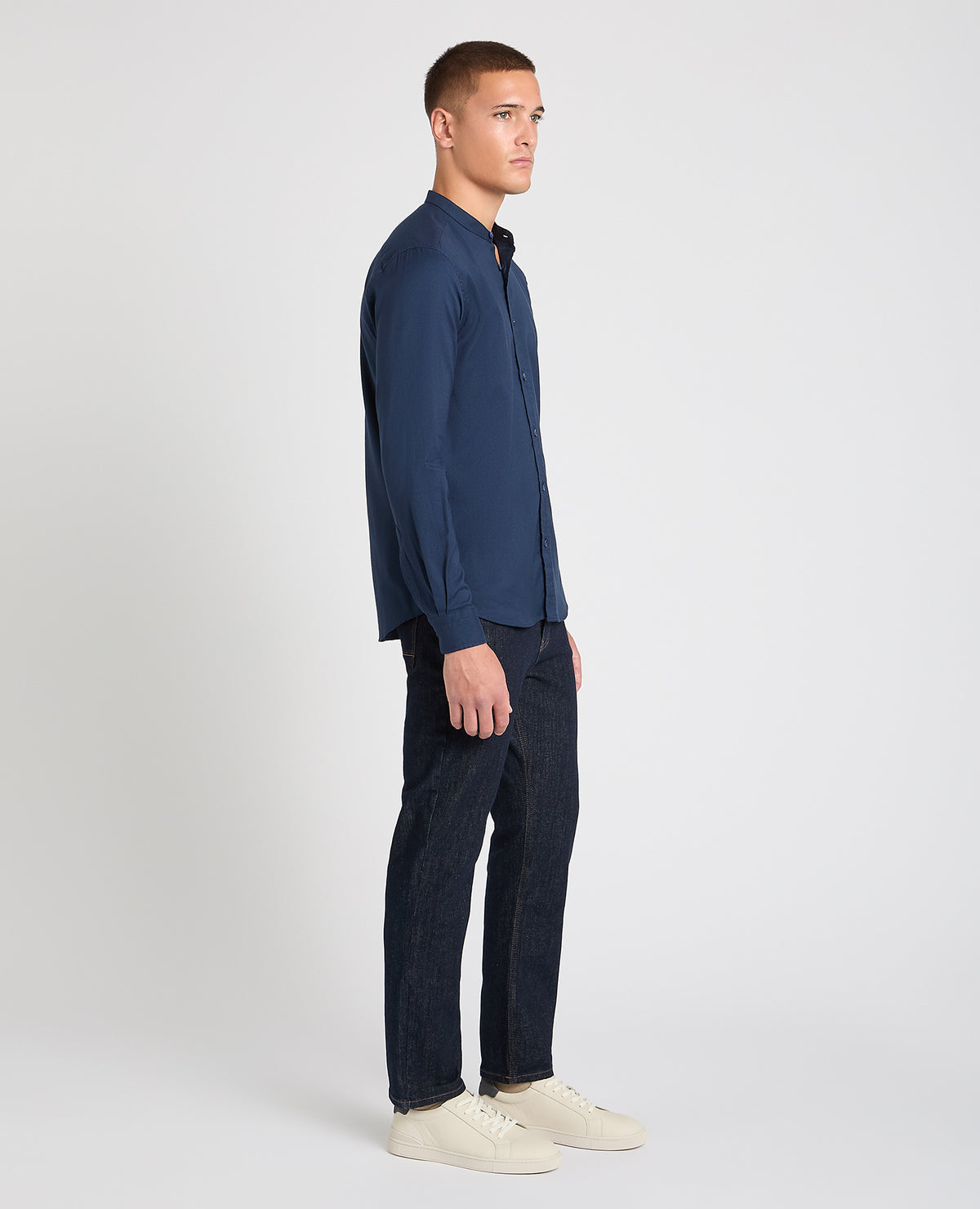 Man wearing a navy casual shirt