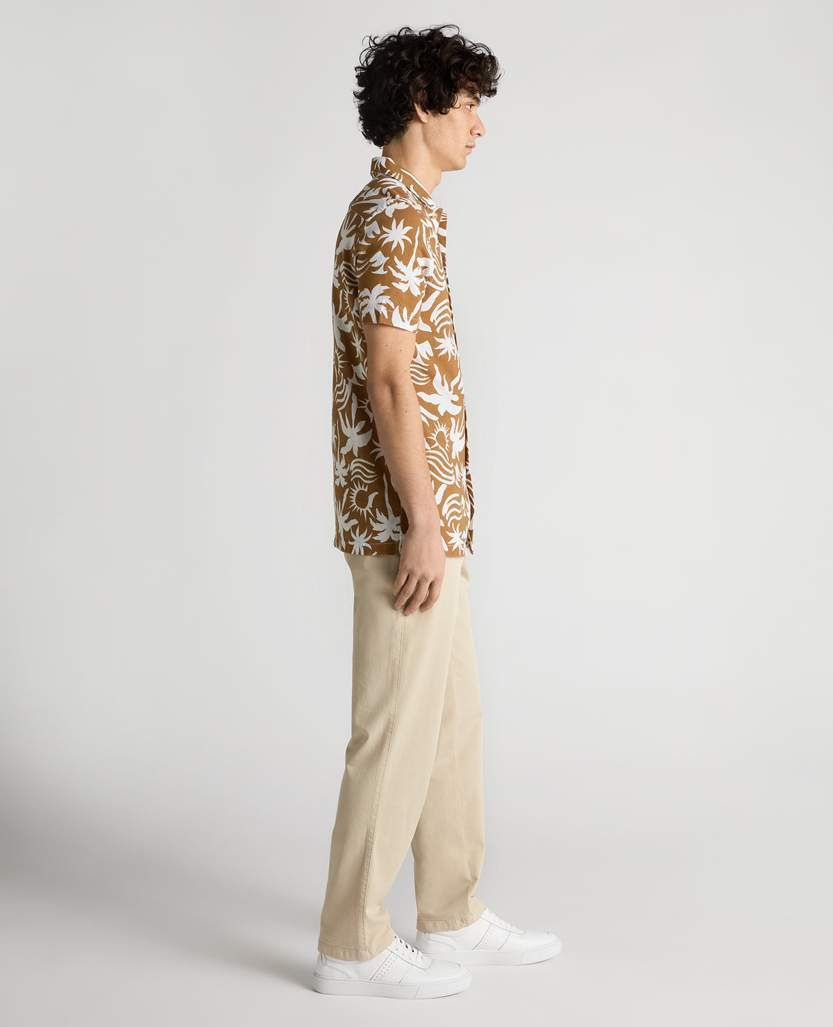 Man wearing a brown Tapered Fit Floral Print Cotton Shirt
