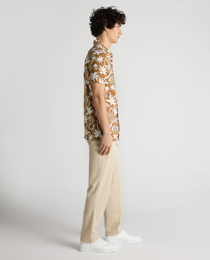Man wearing a brown Tapered Fit Floral Print Cotton Shirt