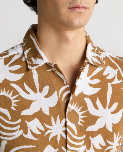 Man wearing a brown Tapered Fit Floral Print Cotton Shirt