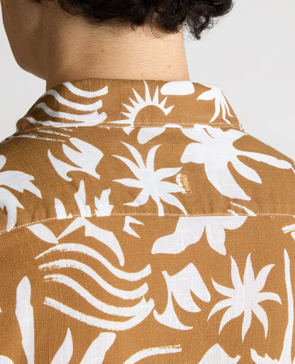 Man wearing a brown Tapered Fit Floral Print Cotton Shirt