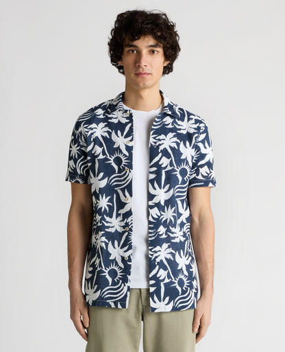 Man wearing a navy Tapered Fit Floral Print Cotton Shirt