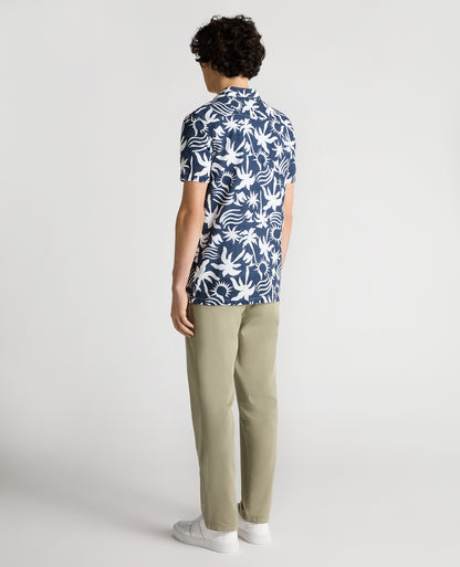 Man wearing a navy Tapered Fit Floral Print Cotton Shirt
