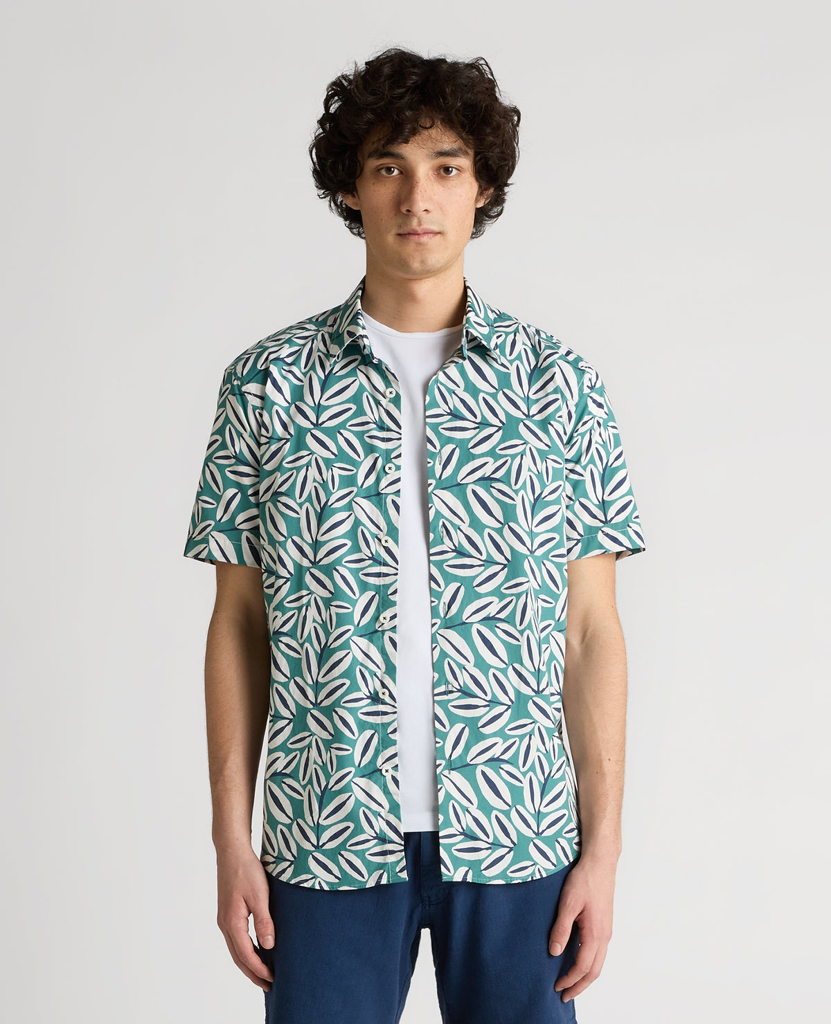 Man wearing a green Slim Fit Cotton Stretch Leaf Print Shirt