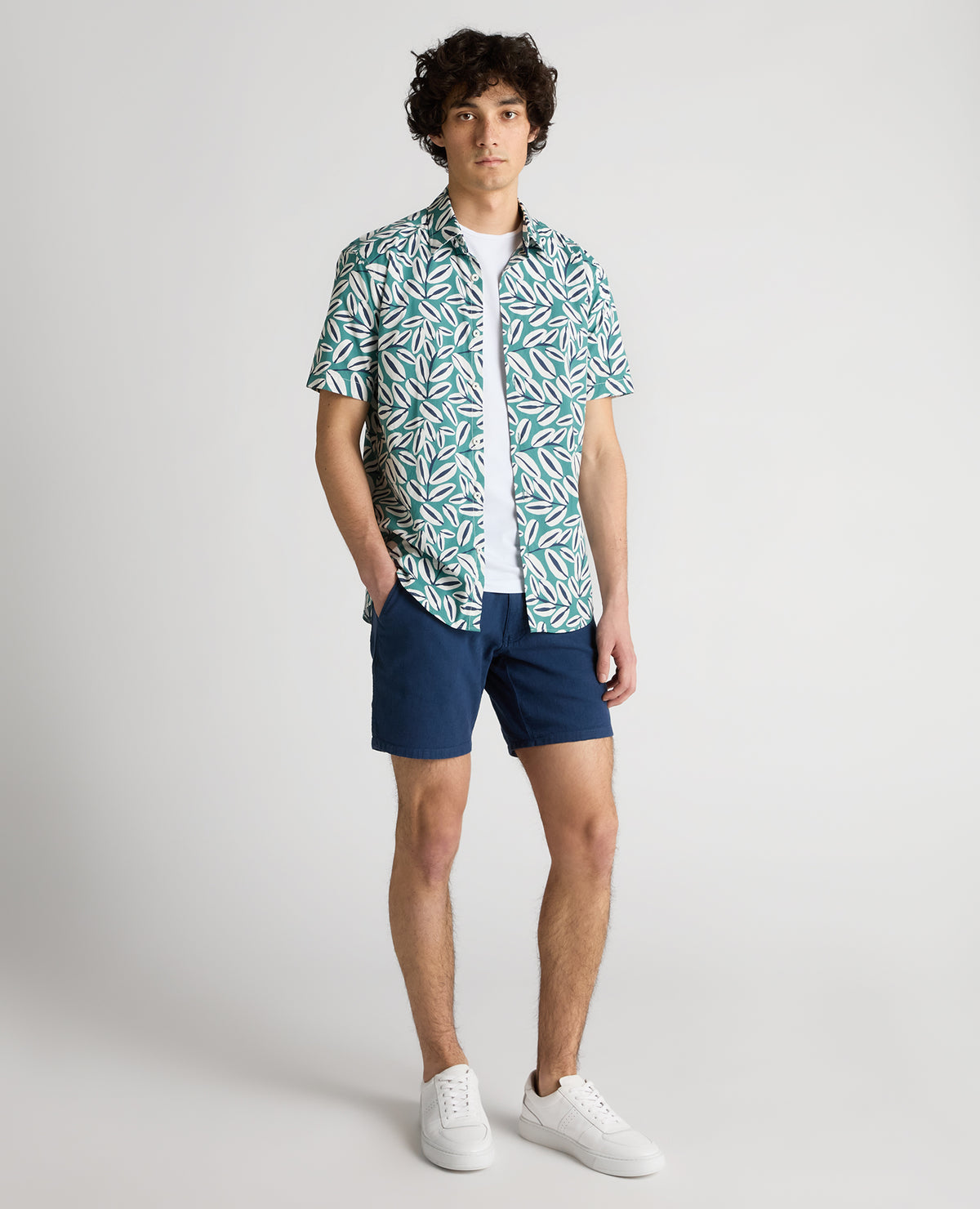 Man wearing a green Slim Fit Cotton Stretch Leaf Print Shirt