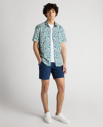 Man wearing a green Slim Fit Cotton Stretch Leaf Print Shirt