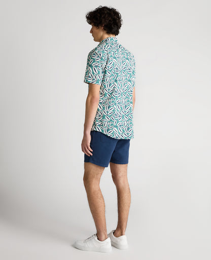 Man wearing a green Slim Fit Cotton Stretch Leaf Print Shirt