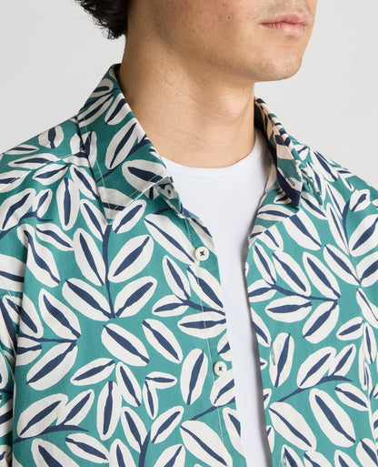 Man wearing a green Slim Fit Cotton Stretch Leaf Print Shirt