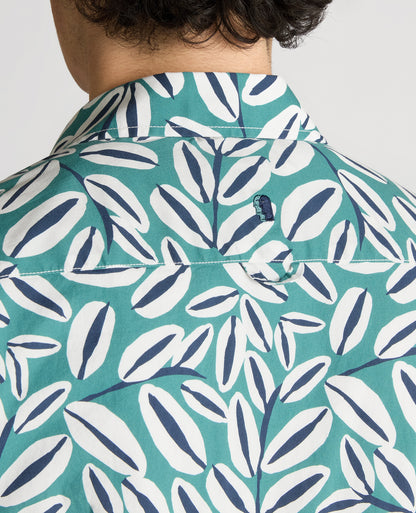 Man wearing a green Slim Fit Cotton Stretch Leaf Print Shirt