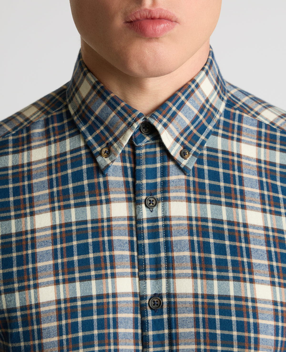 Man wearing a blue Slim Fit Cotton Check Shirt