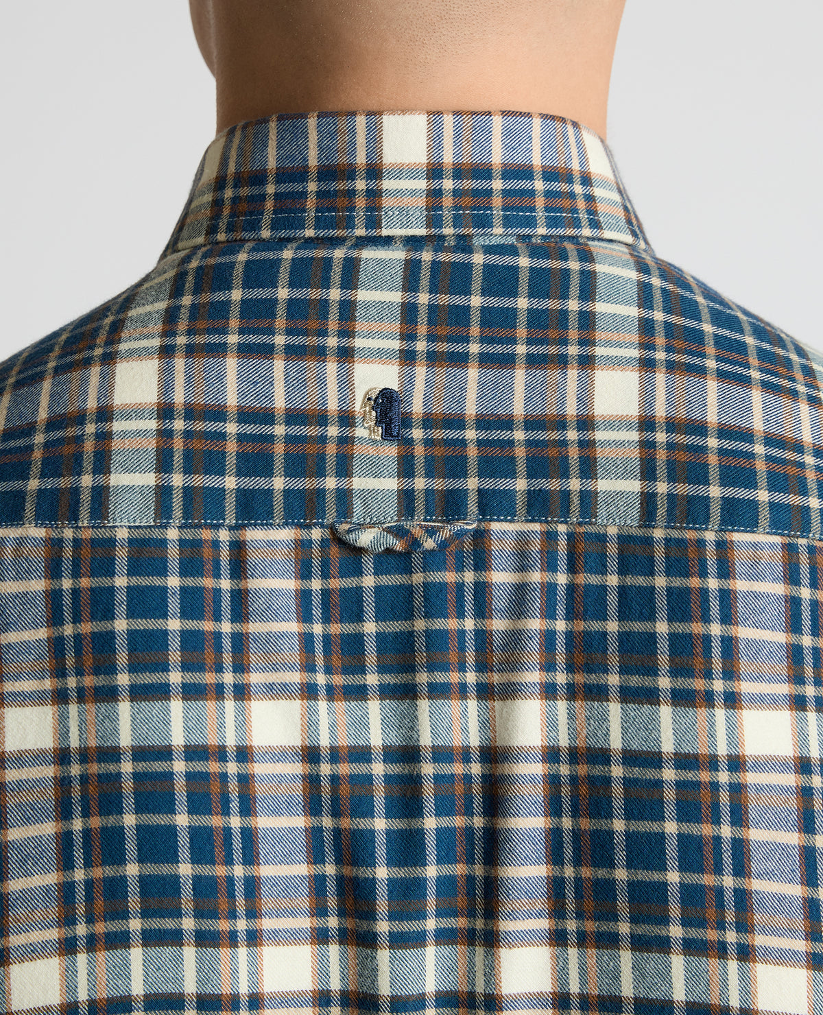 Man wearing a blue Slim Fit Cotton Check Shirt