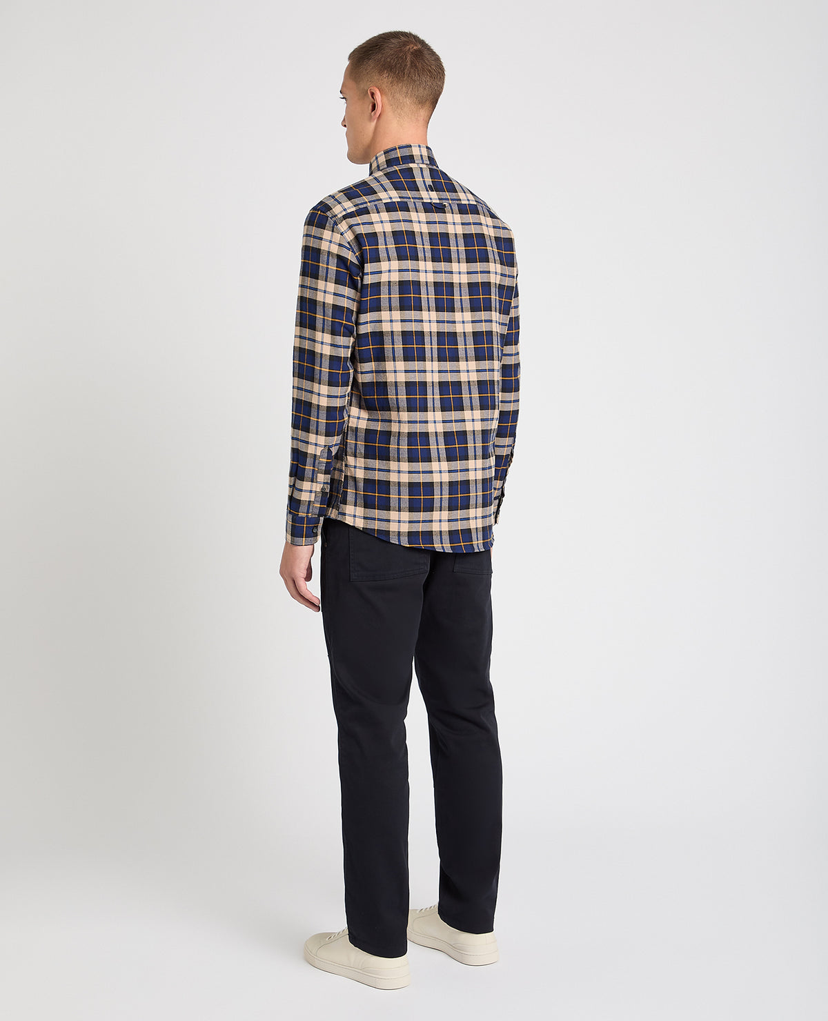 Man wearing a blue casual shirt