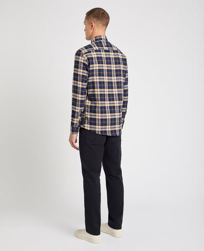 Man wearing a blue casual shirt