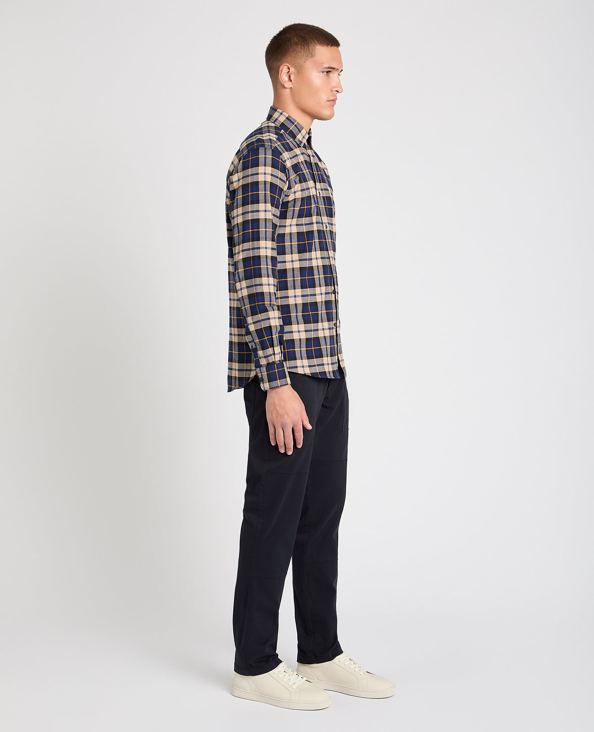 Man wearing a blue casual shirt