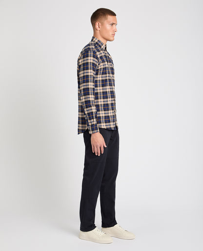 Man wearing a blue casual shirt