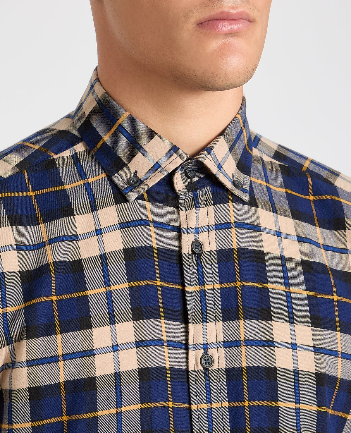 Man wearing a blue casual shirt