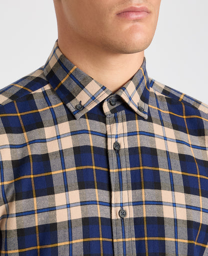 Man wearing a blue casual shirt