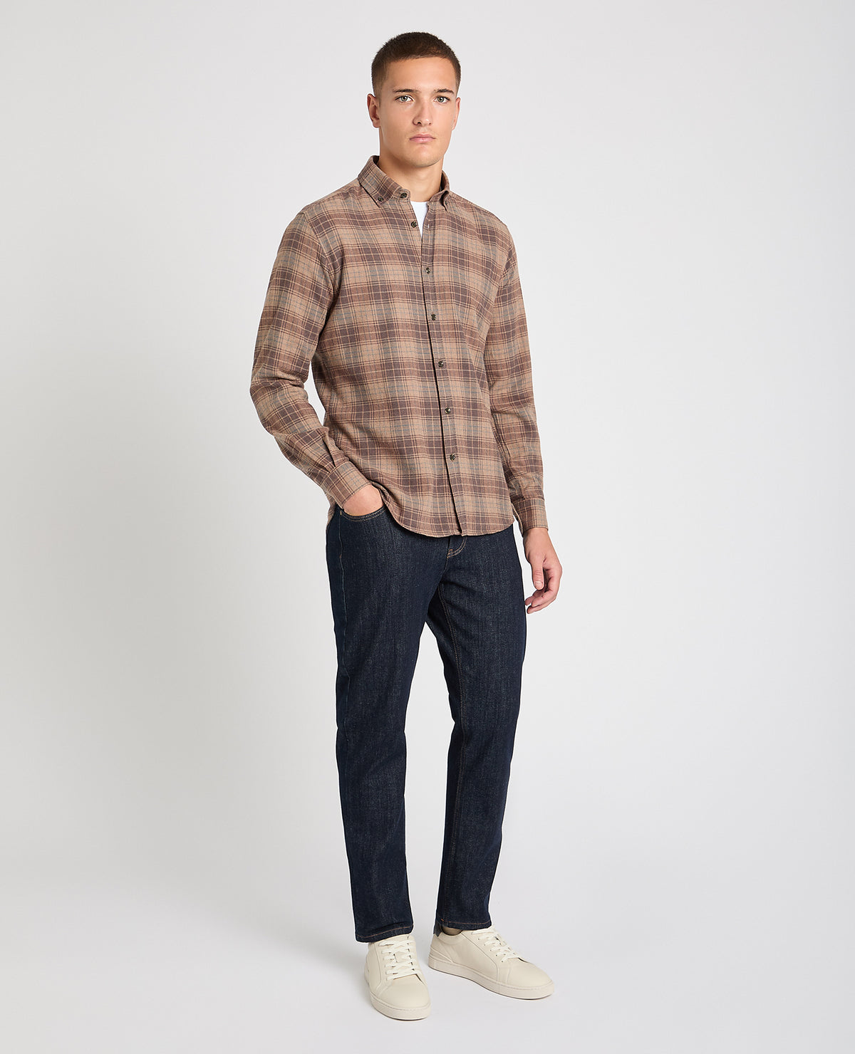 Man wearing a brown casual shirt