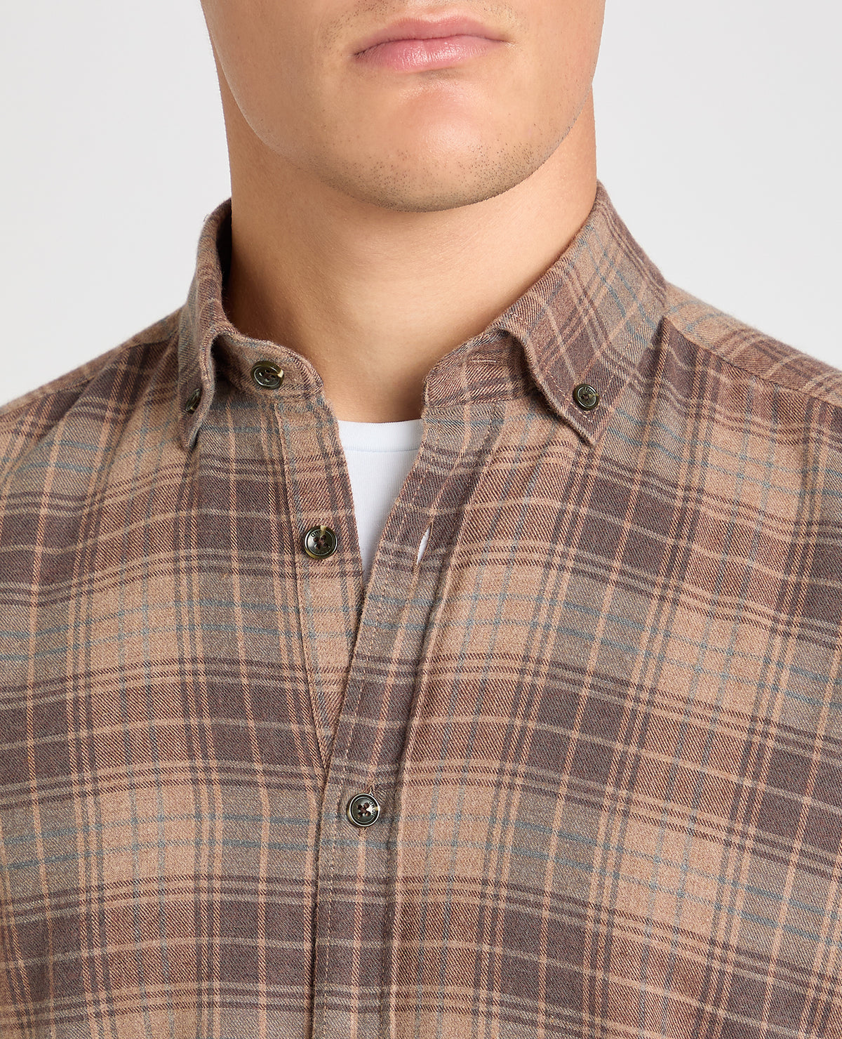 Man wearing a brown casual shirt