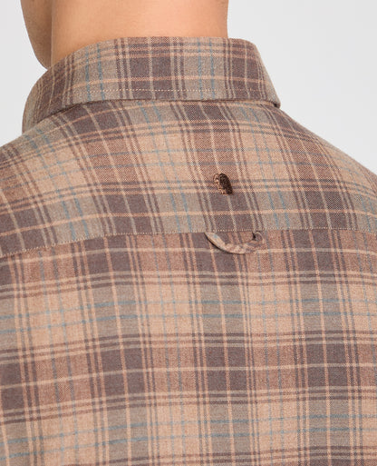 Man wearing a brown casual shirt