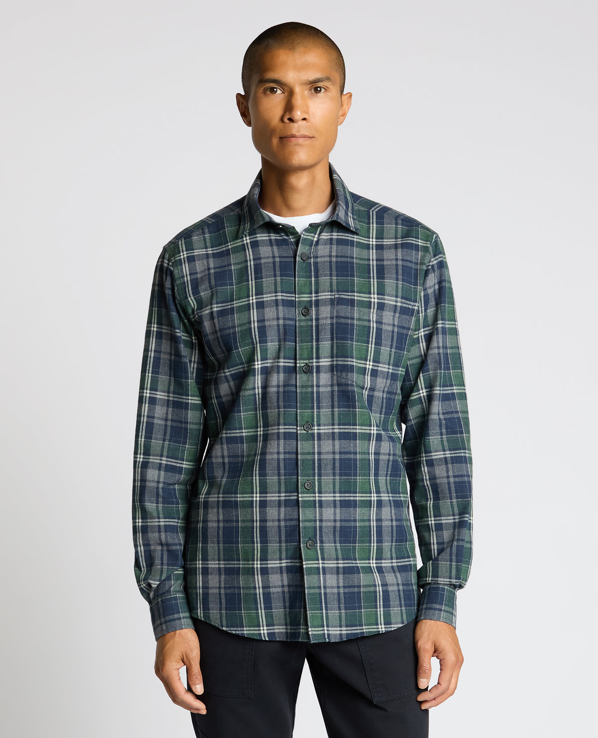 Man wearing a navy Tapered Fit Cotton-Blend Check Shirt