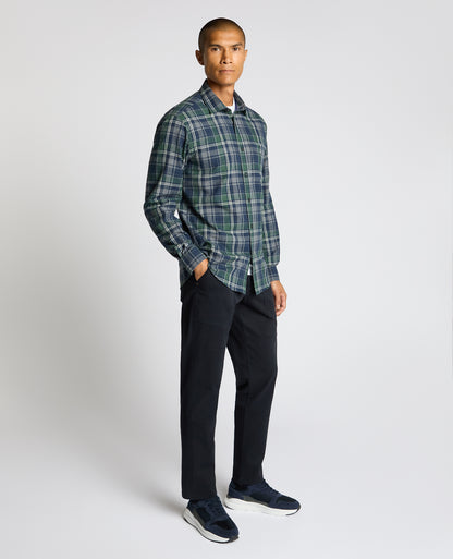 Man wearing a navy Tapered Fit Cotton-Blend Check Shirt