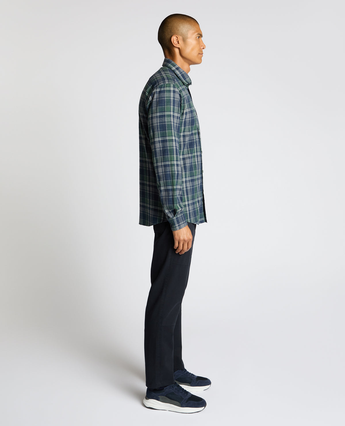 Man wearing a navy Tapered Fit Cotton-Blend Check Shirt