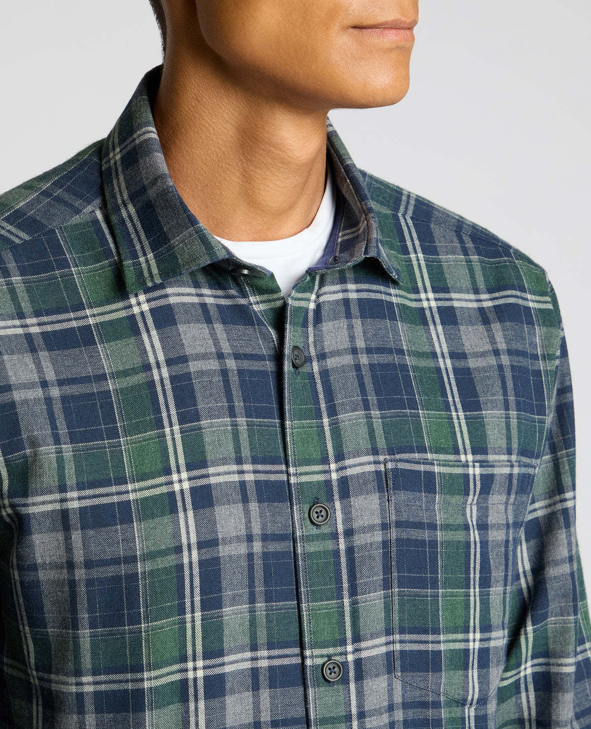 Man wearing a navy Tapered Fit Cotton-Blend Check Shirt