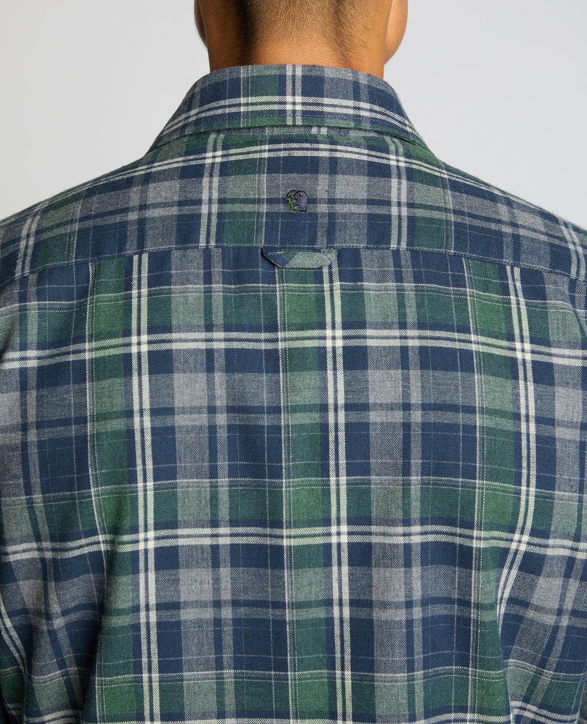 Man wearing a navy Tapered Fit Cotton-Blend Check Shirt