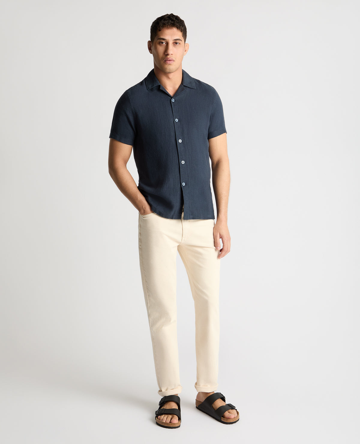 Man wearing a blue casual shirt