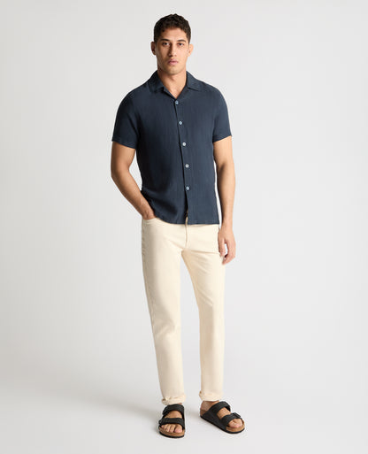Man wearing a blue casual shirt