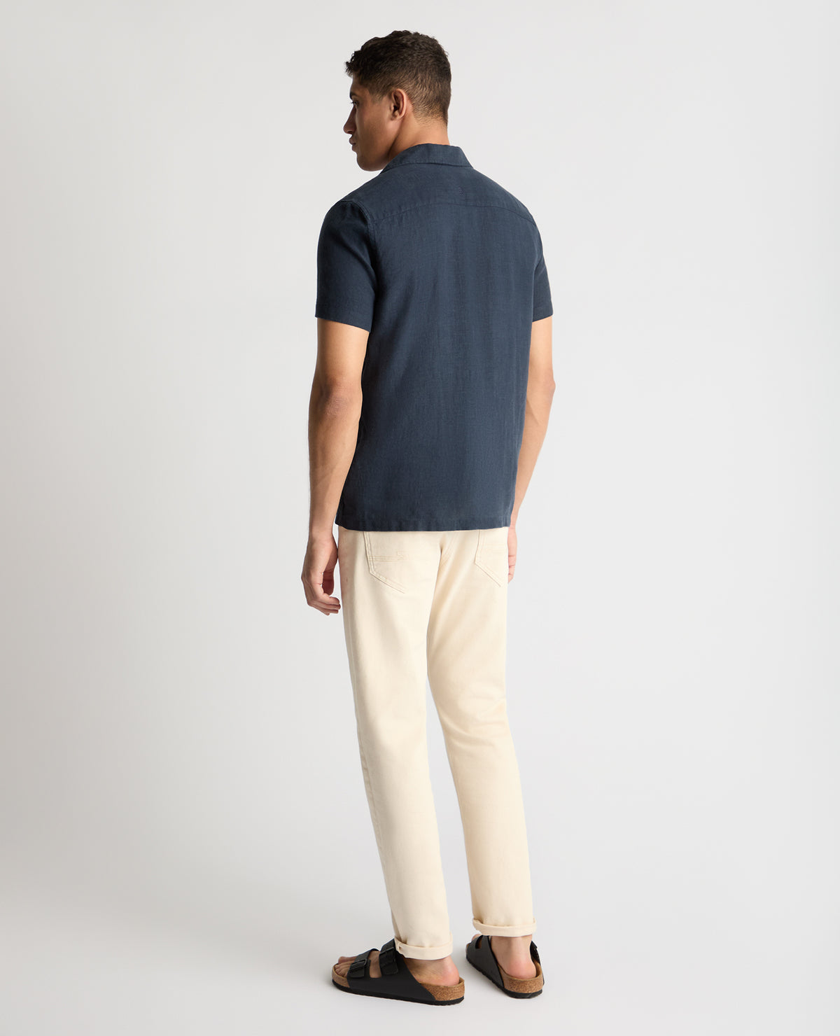 Man wearing a blue casual shirt