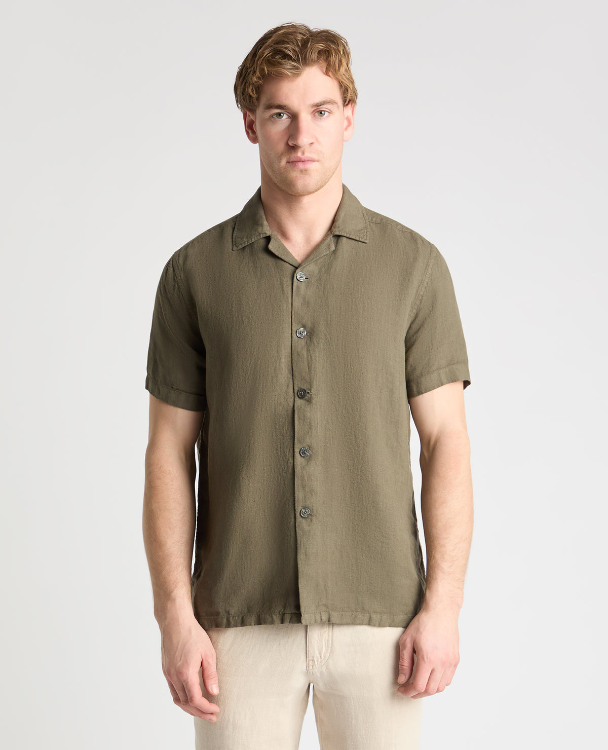 Man wearing a green casual shirt